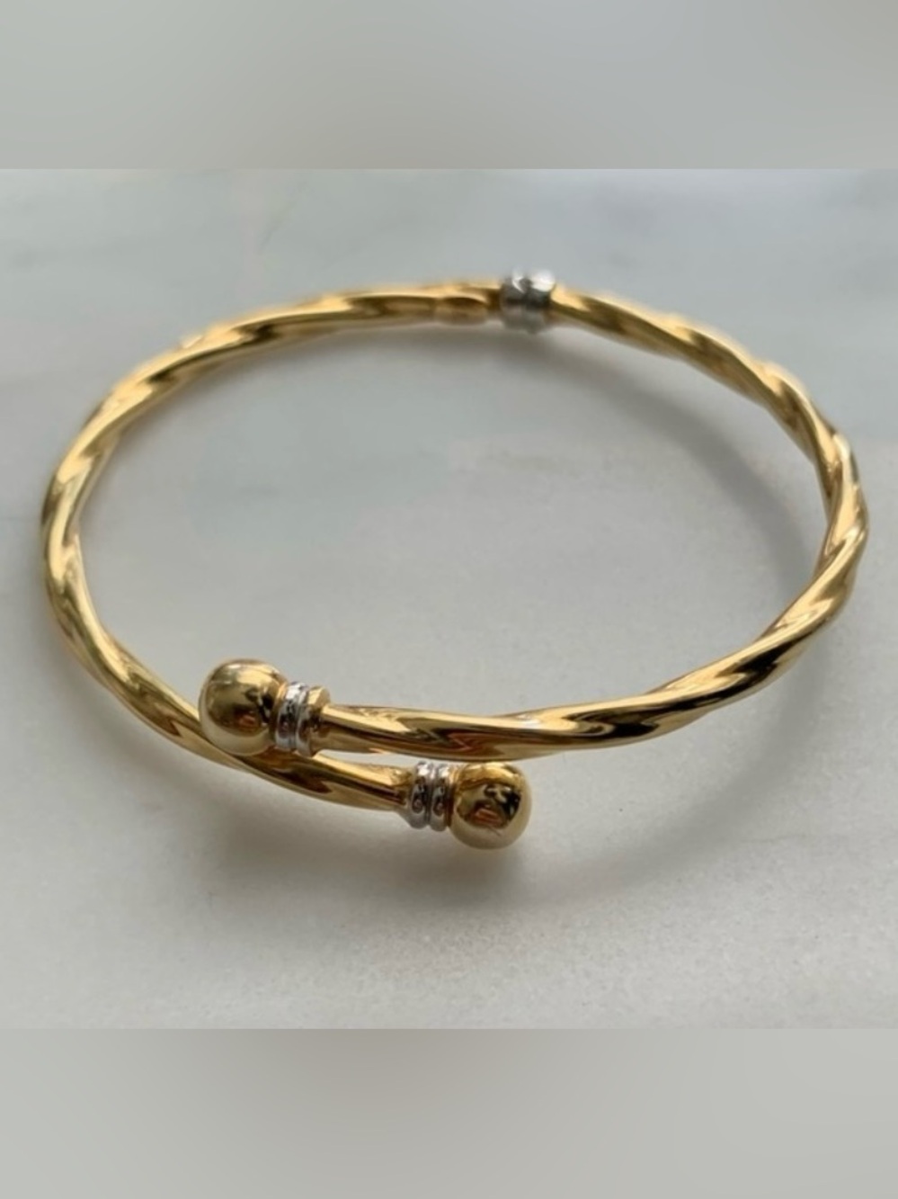 14k yellow/white gold twisted Open Cuff Bracelet with white gold accent rings